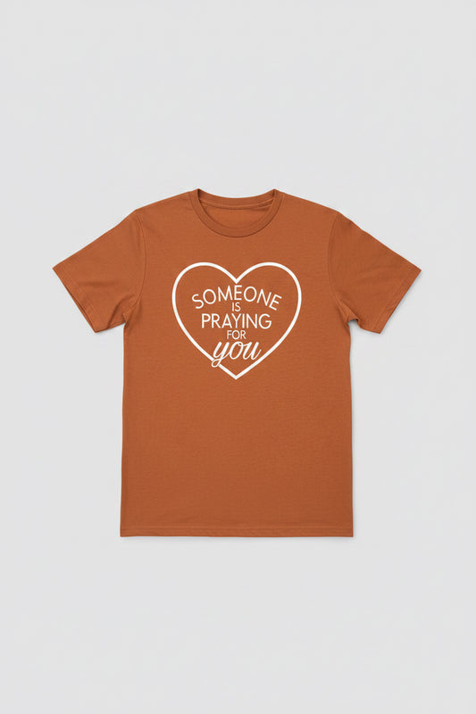“Someone Is Praying For You” Inspirational Graphic Tee"